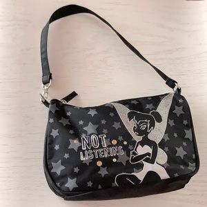 Black and silver tinker bell mini purse with gold embellishments.